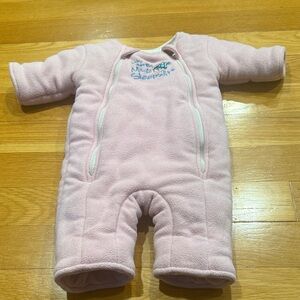 Baby Merlin’s pink magic sleepsuit size large .